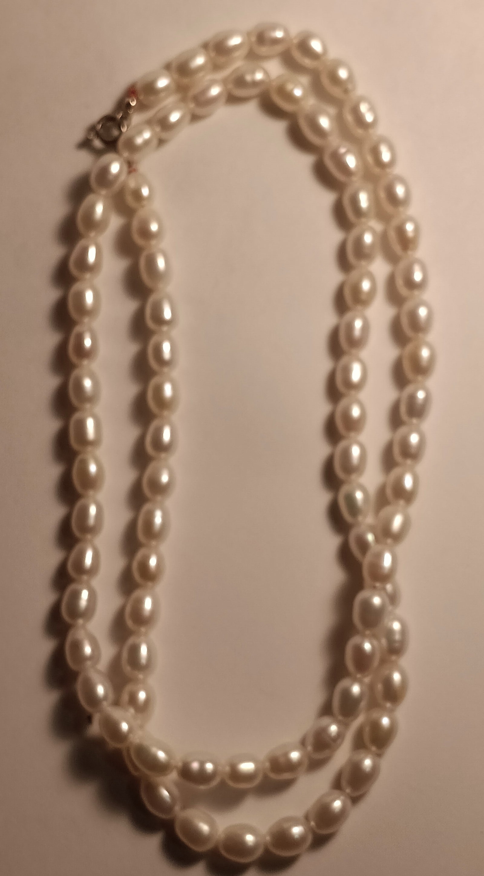 Beautiful String of Elliptical 'Button' Pearls Necklace 26 inches.: Luster is great. Never worn.