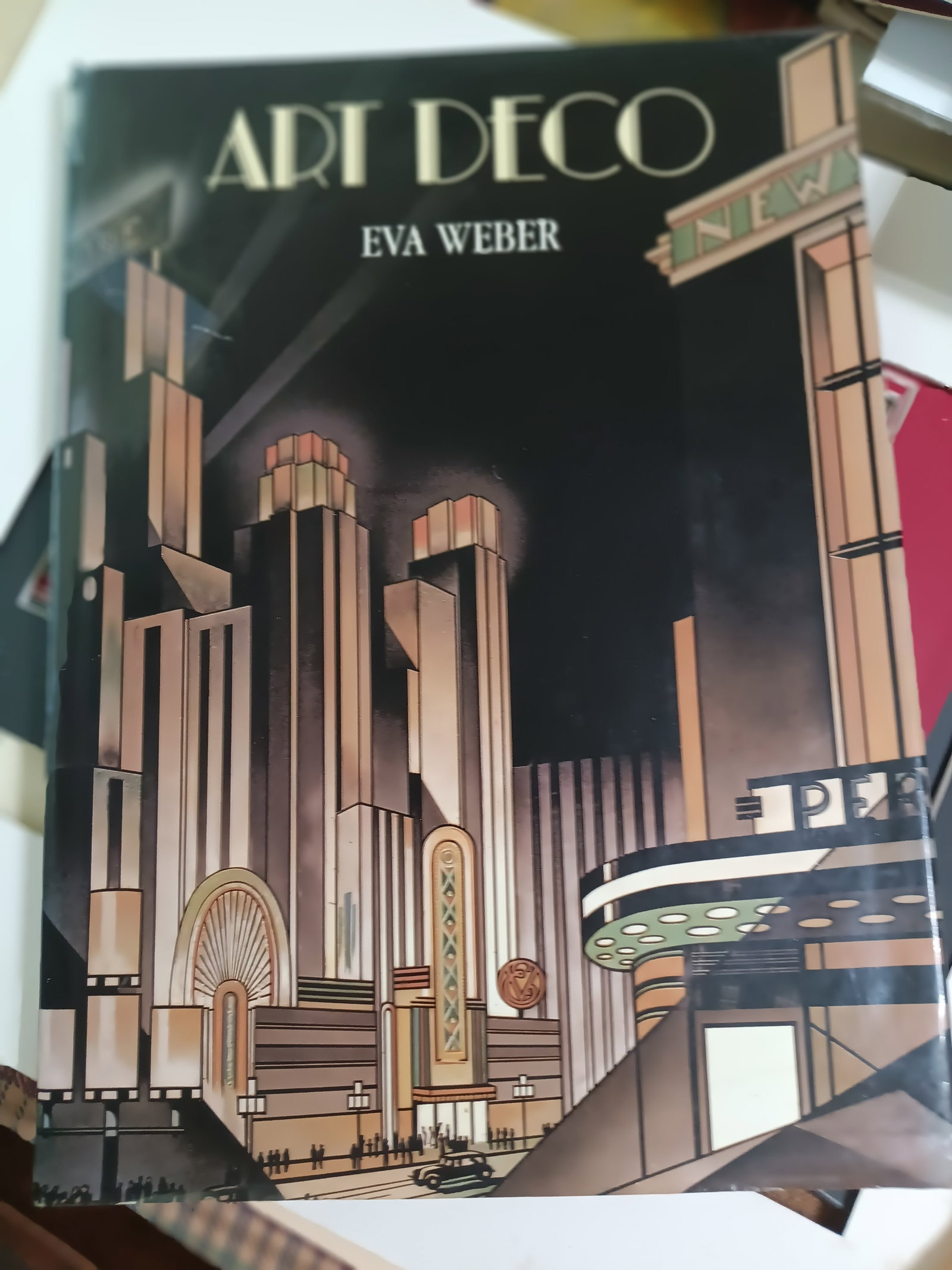 Art Deco Design/Style Reference Book Eva Weber: Art Deco has entered the 'antique' reference category. The expression began with the Paris exposition in 1925, from L'Exposition des Arts et Decoratifs (The exposition of Arts and Decoratives). Profus