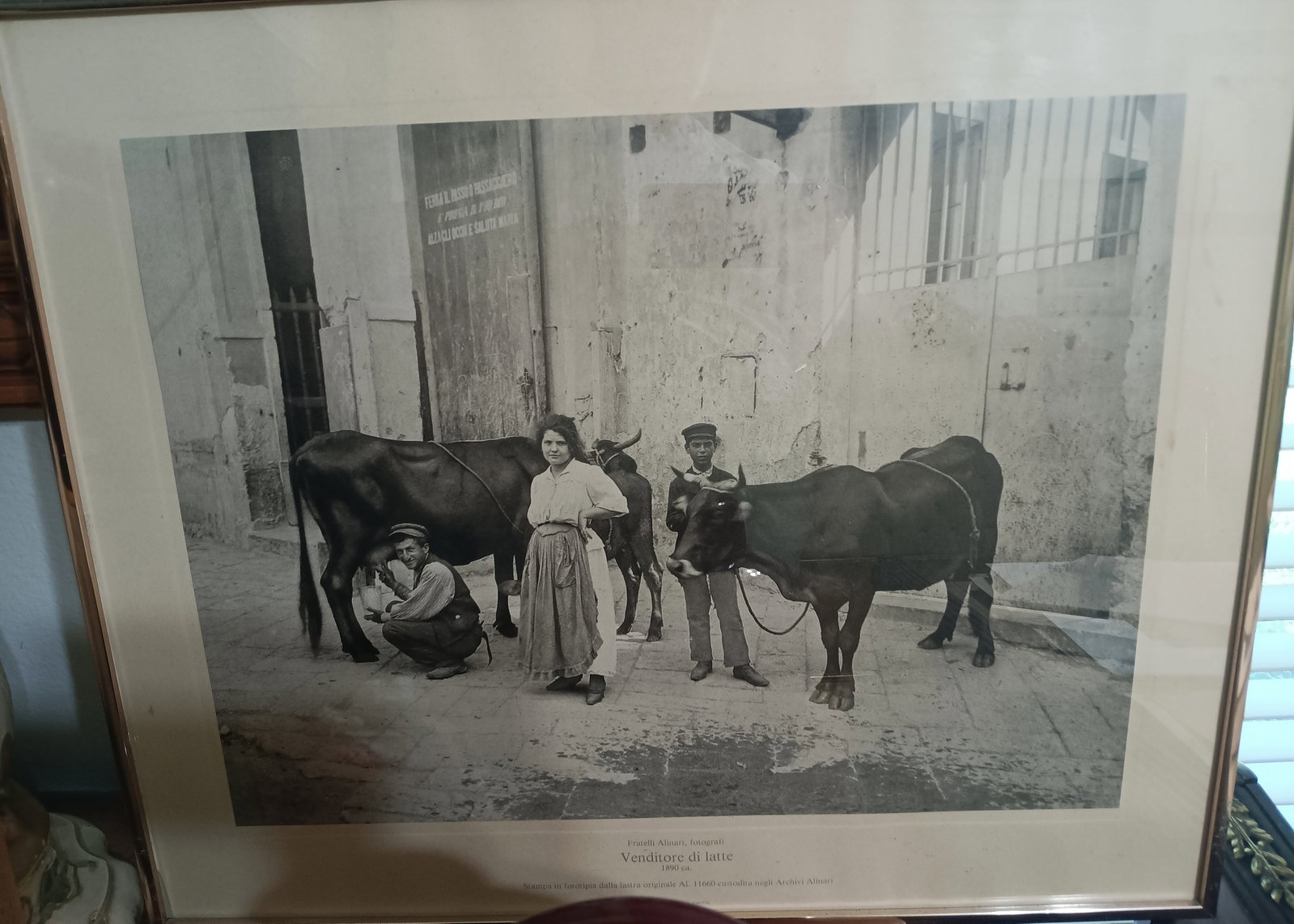Early Photography Print Italian Village Milk Vendor Alinari Brothers: Printed in Italy. Chromed steel frame. Ready to hang. Circa 24 x 20 inches framed. Alinari Photography was founded in 1852. Here is a link to information on Fratelli Alinari (Alinari Brothers) photogr