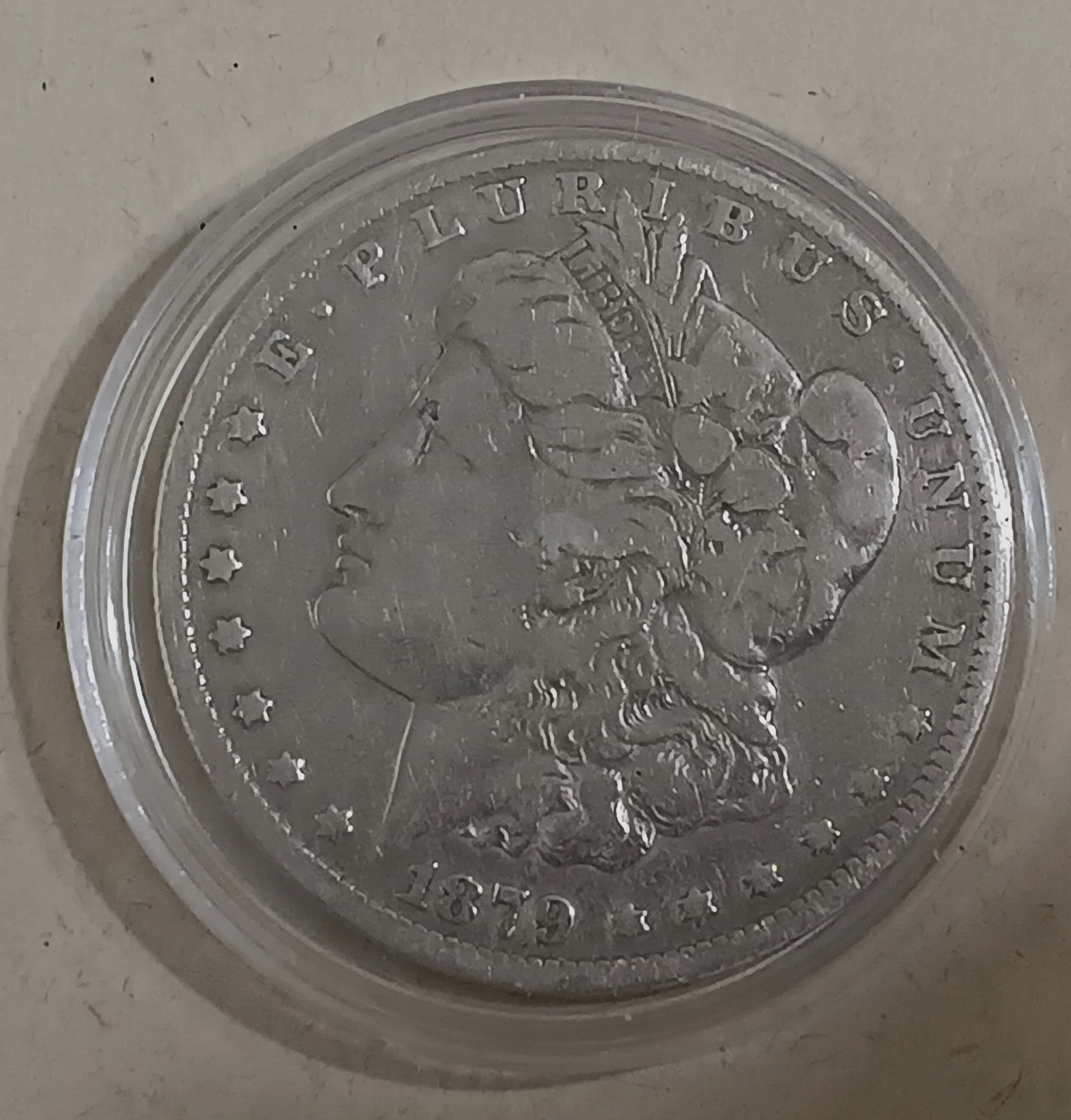 1879 O Morgan Silver Dollar: New Orleans mint. 90% silver.