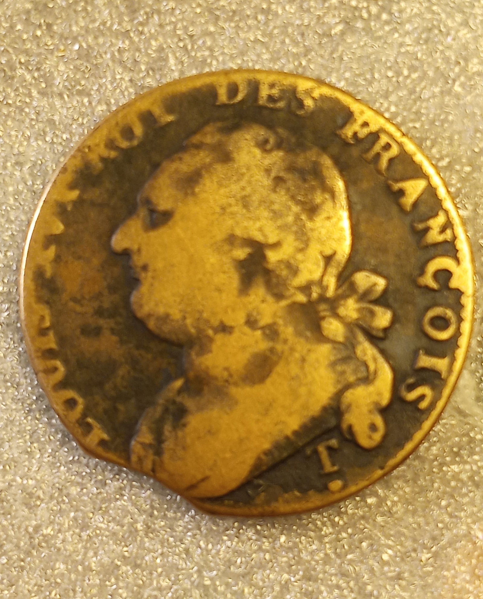 France 1791 Louis XVI Bronze Coin 12 Deniers: Clipped coin. Last coinage of King Louis XVI. Coin was clipped to remove it from circulation. In earlier times it was a punishable crime to deface the currency, or to exchange defaced currency. The