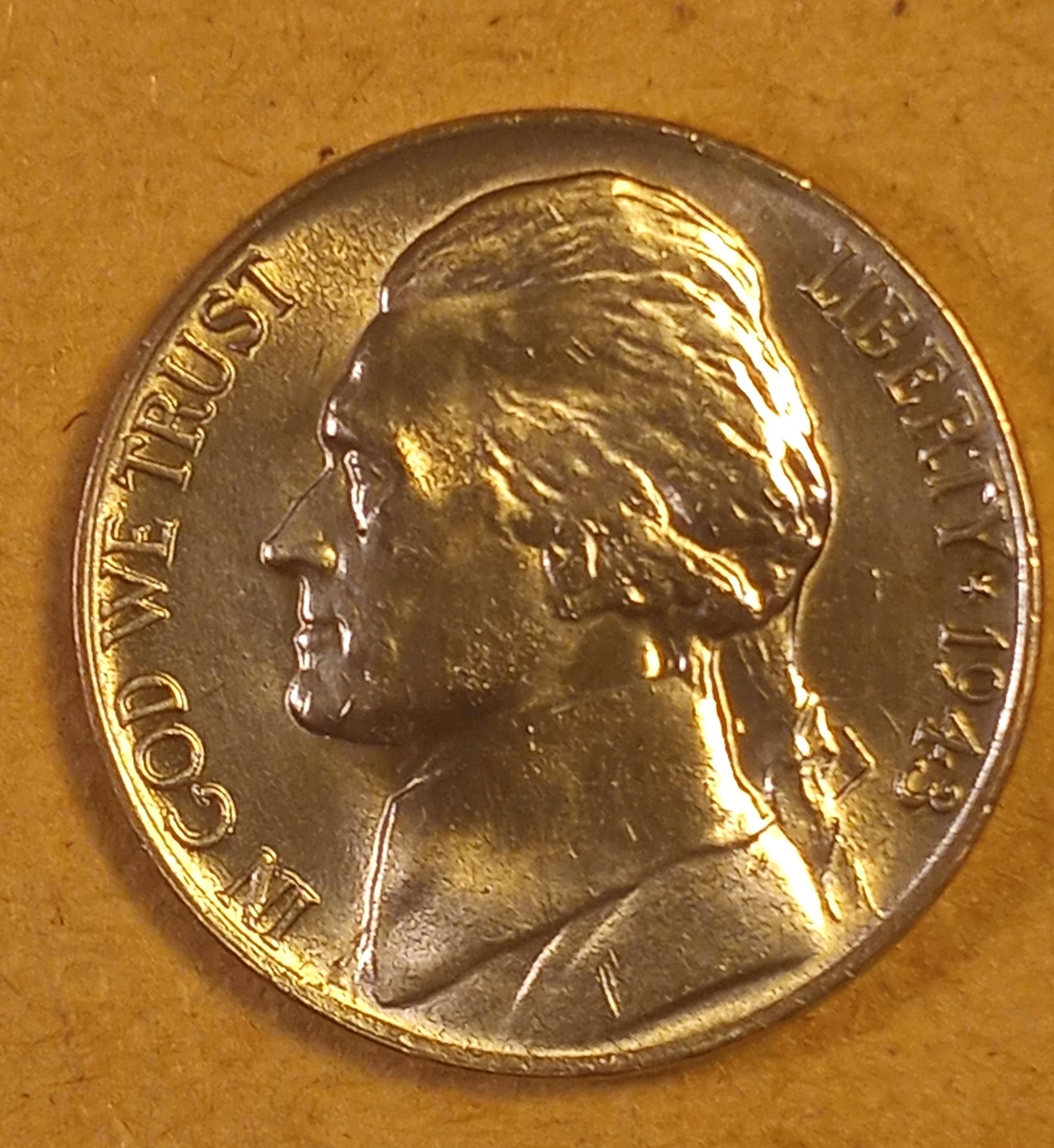 1943 P Uncirculated Jefferson Wartime Nickel: 35% silver composition. Ungraded - uncirculated.
