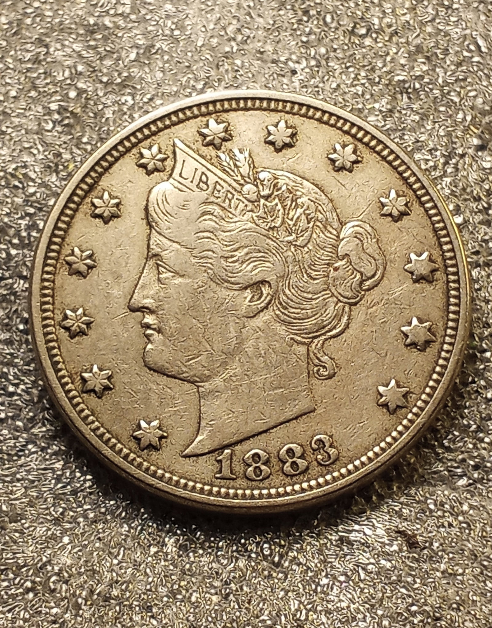 1883 Liberty Nickel: Ungraded. 'No cents' variety. Bold strike