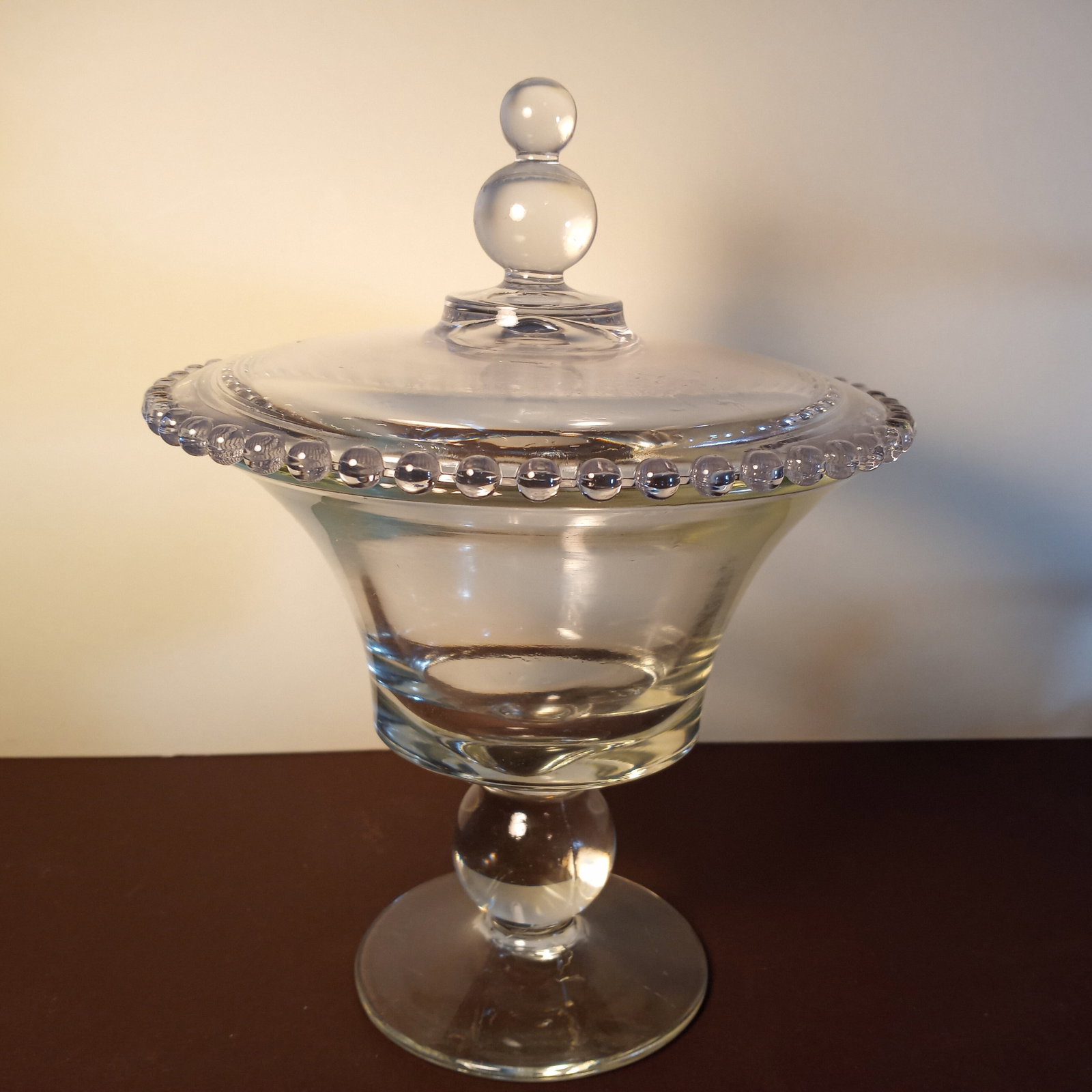 Beautiful American Glass Vintage Candlewick Lidded Bowl: Candlewick was a design introduced by Imperial Glass (1900-1984) under designer Earl Newton. It is actually crystal glassware. Here is a link to info about Candlewick. https://antiquesknowhow.com/cand