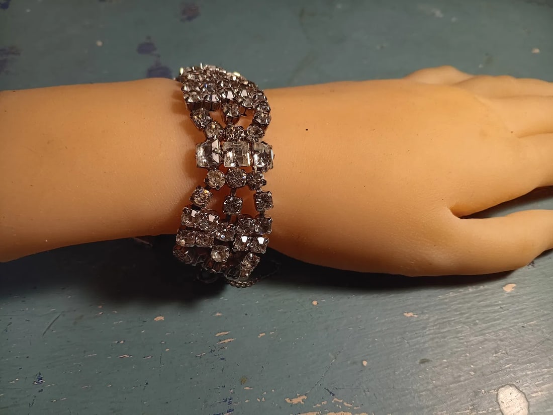 Fine Vintage Kramer New York Rhinestone Bracelet: Good clasp and catch chain. No missing stones. Stones still brilliant. None grey. Signed Kramer New York. Note: Stones much brighter than photos indicate.