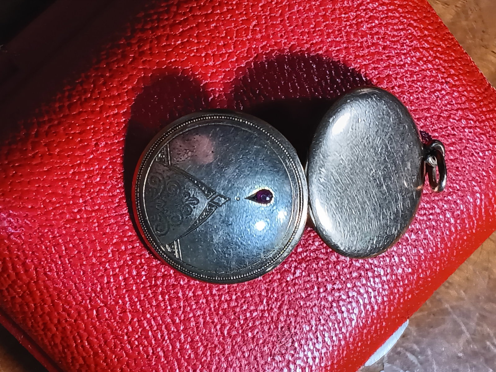 Beautiful Gold Plated Victorian Era Double Locket Pendant w/ Ruby or Spinel: Genuine antique period Victorian piece. Chasing. Probably between 1880 and 1900. Hinge is good. Some gold loss, dulling.