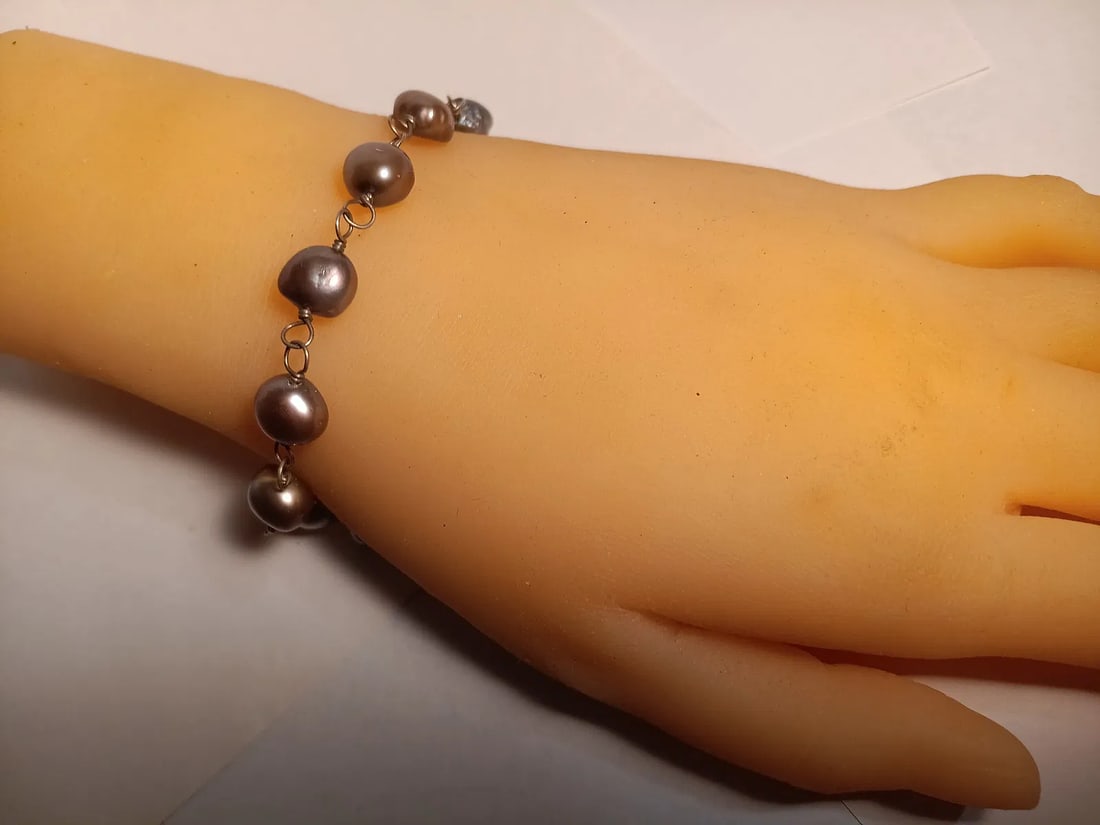 Sterling Silver and Grey Button Pearl Bracelet 8 1'2 inches: Has designer tag with sterling marks. No issues.