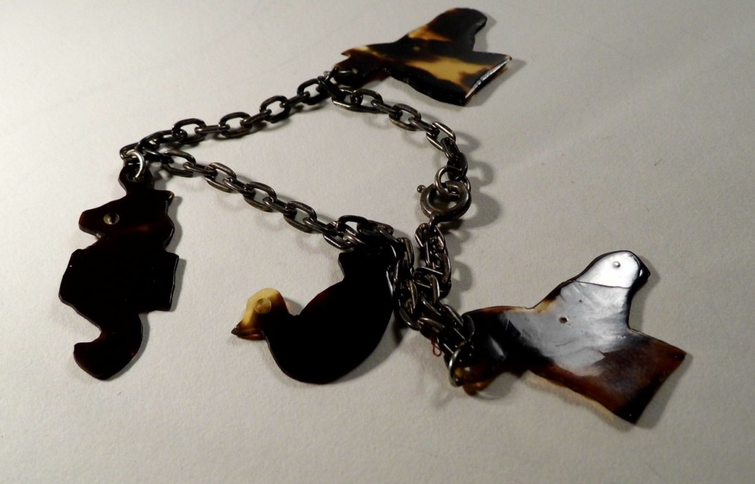Vintage Tortoise Shell Charm Bracelet: Bracelet.Jewelry from this auction run 1-143. More fun jewelry and some abject bling beginning at 209.