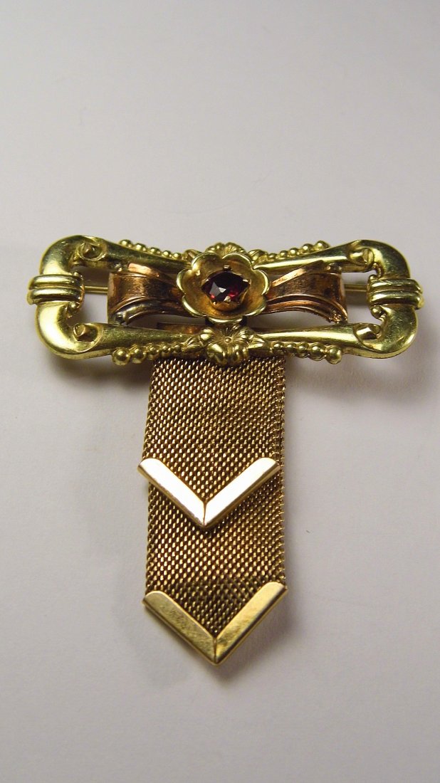 1910-20 Antique Gold Filled Lavalier Pin IH: Marked 1.20 Gold Filled IH, for International Harvester. A promotional line of gift items for customers, given at purchase and holiday periods. Measures 2 1/8 inches.