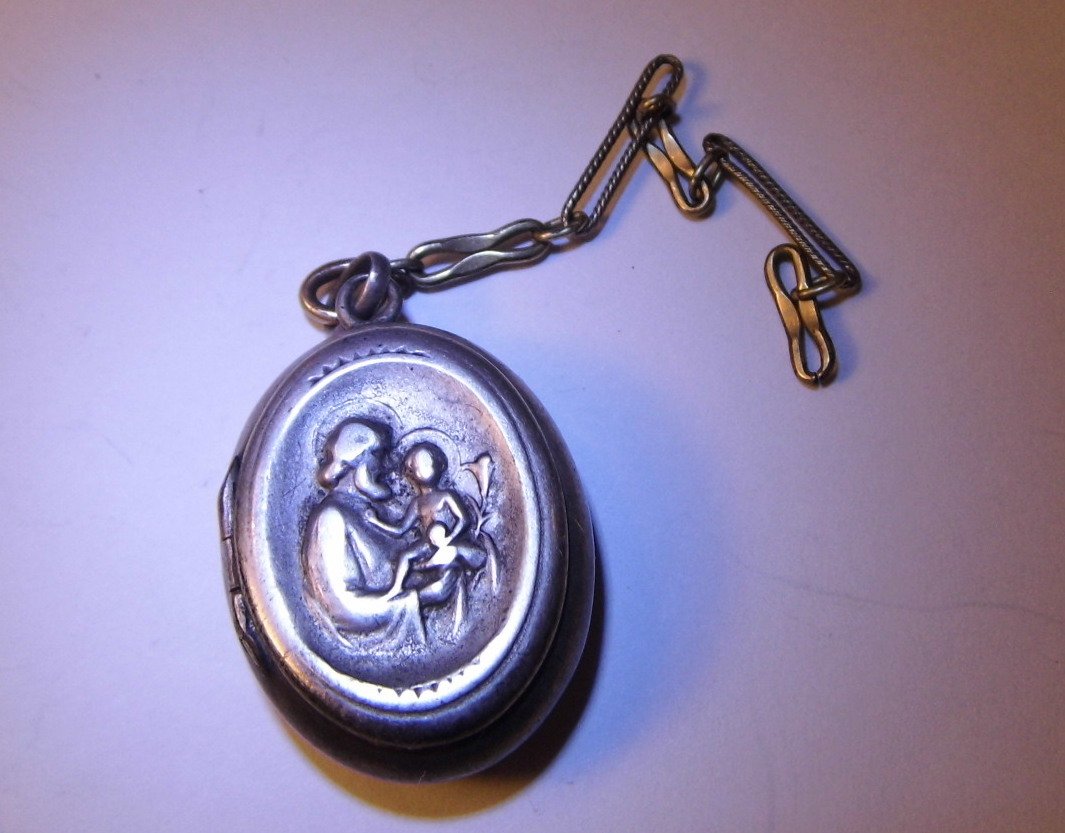 Antique Miniature Rosary Locket Joseph Jesus: Measures just over an inch. 3 inch portion of chain remains. Name and inscription/numerals inside. Once had a silver wash, but long since gone. Locket shuts and snaps tight.