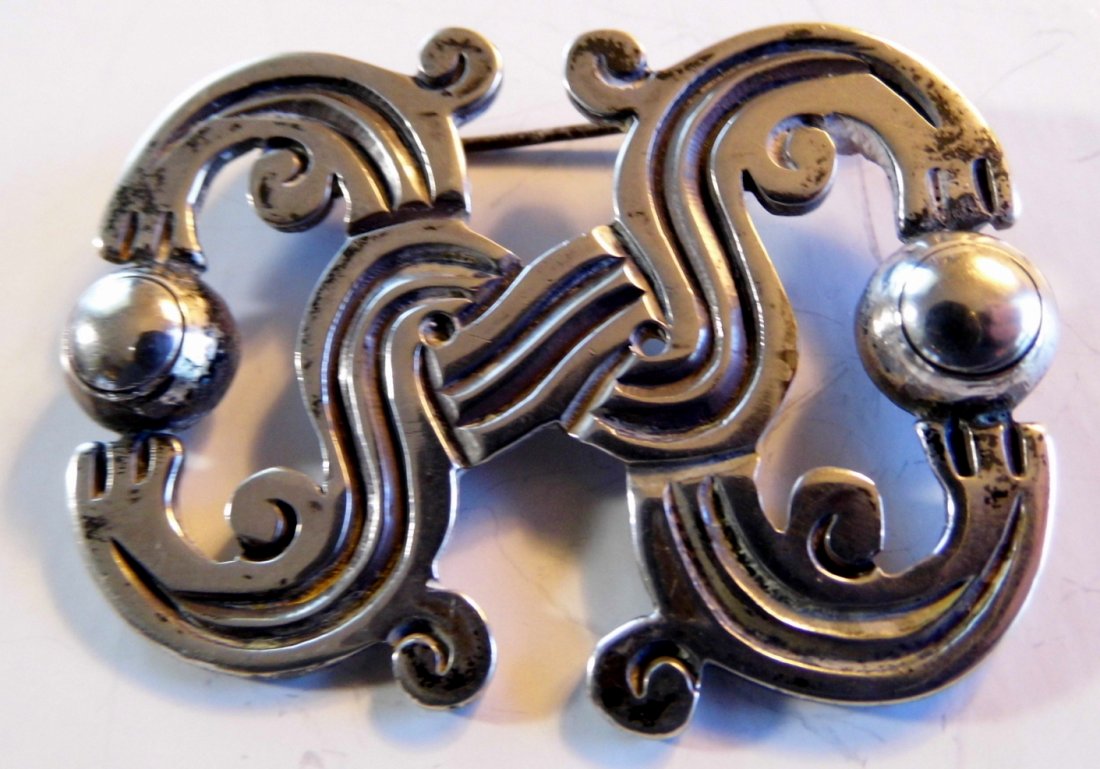 Old Taxco Silver Artesan Piece Melendez Brooch: Fine vintage Raphael Melendez brooch with Taxco mark and Melendez' conjoined RM mark. Rafael Melendez was an apprentice of William Spratling. 2 1/2 inches wide. Pre-Columbian in style.