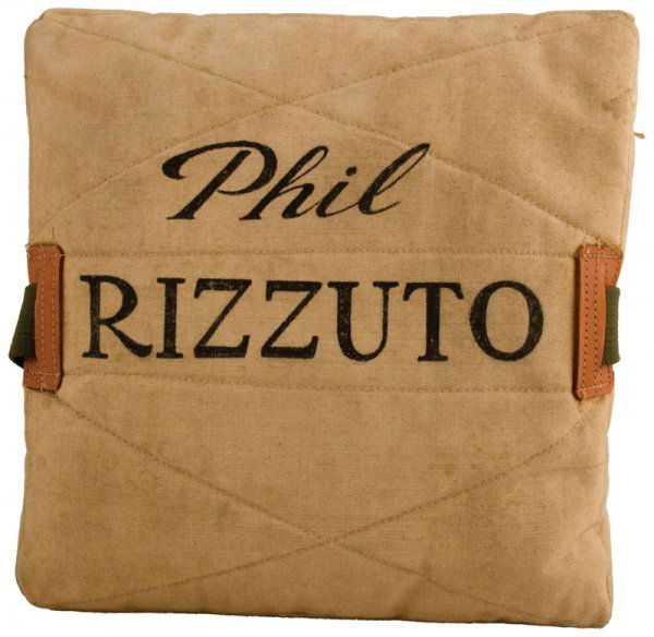 Phil Rizzuto Retiremen tBaseball Base: Phil Rizzuto Retiremen tBaseball Base Upon the occasion of his retirement, Phil Rizzuto was presented with an actual base from the infield. And this one has his name in big bold letters across its top