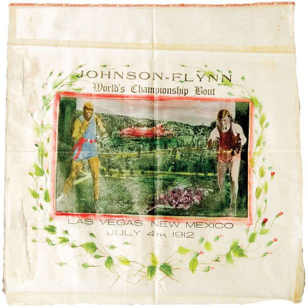 Jack Johnson vs. "Fireman Jim Flynn Advertising Si: Jack Johnson vs. "Fireman Jim Flynn Advertising Silk A beautiful color silk fabric advertisement for the July 4, 1912 heavyweight championship fight between Jack Johnson and Jim Flynn. Johnson was abl