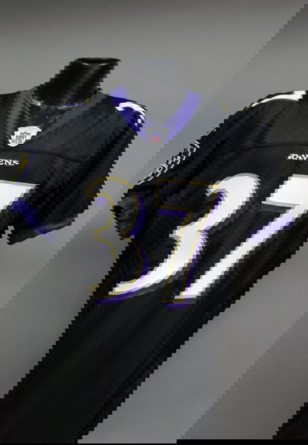 Sanders Signed Game Worn Ravens Jersey #37 LOA: Deion Sanders, game used Baltimore Ravens black alternate jersey from the 2004 season. Reebok manufacturer tag with size 44 flag tag on front tail of the shirt. The number 37 and name plate on the rev