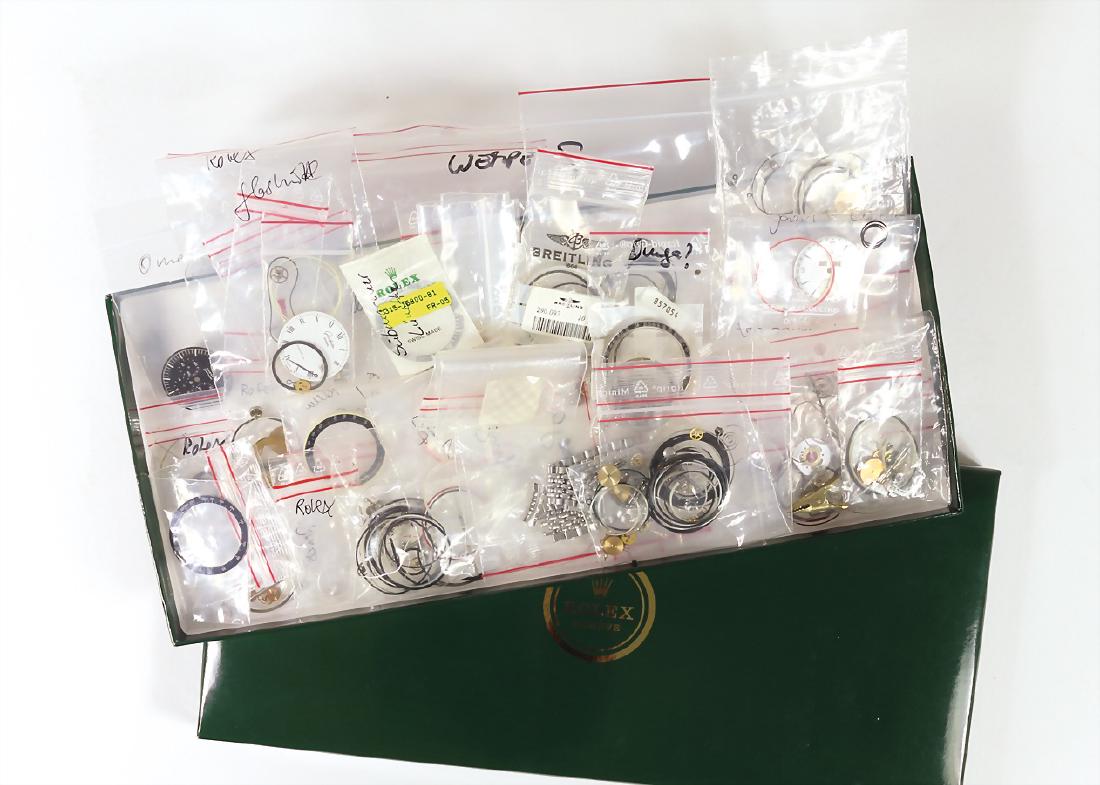 Lot: Rolex Schatulle mit diversen Uhrenersatzteilen (1 of 1)