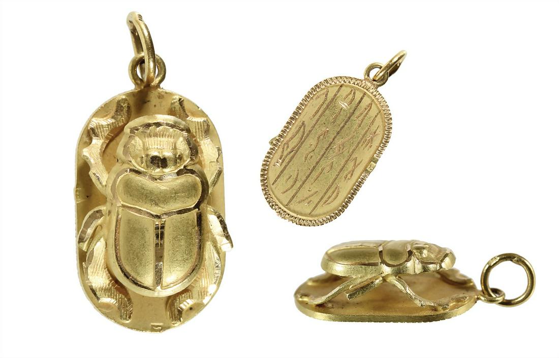 pendant, scarab, yellow gold 750/000, plastic worked: pendant, scarab, yellow gold 750/000, plastic worked beetle , reverse with hieroglyphics, height = 3.8 mm, total 4.1 g German Description AnhÃ¤nger, SKARABÃ„US, GG 750/000, KÃ¤fer plastisch aus