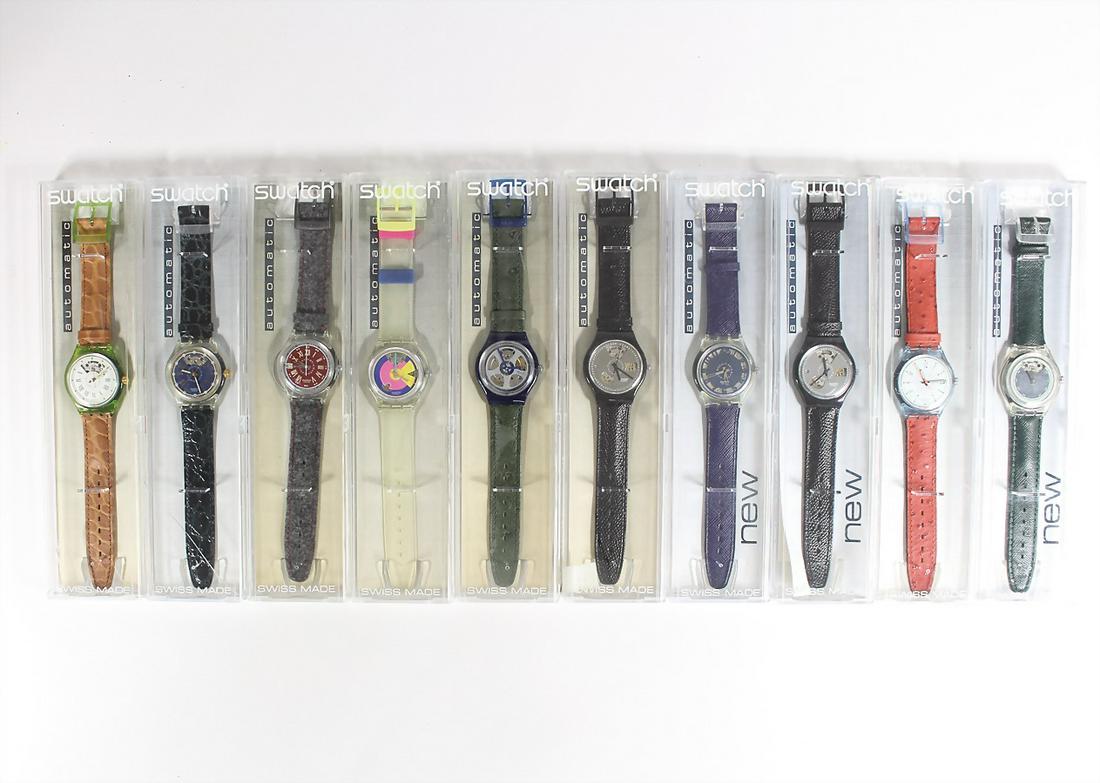 lot: 10 Swatch clocks, self-winding, with original caskets, unworn, unchecked ! German Description: lot: 10 Swatch clocks, self-winding, with original caskets, unworn, unchecked ! German Description Lot: 10 Swatchuhren, Automatik, mit Originalschatullen, ungetragen, ungeprüft !