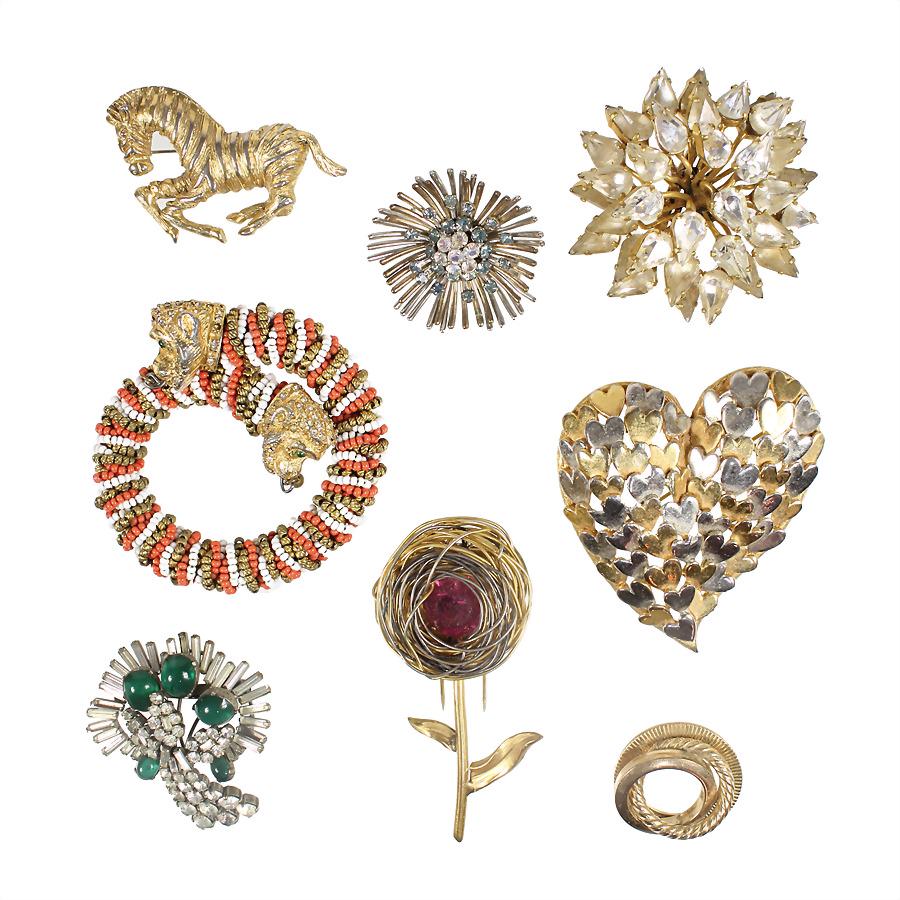 lot: fashion jewelry: 7 brooches, partially signed France/Germany/CIS and  CADORO, some set with (1 of 1)