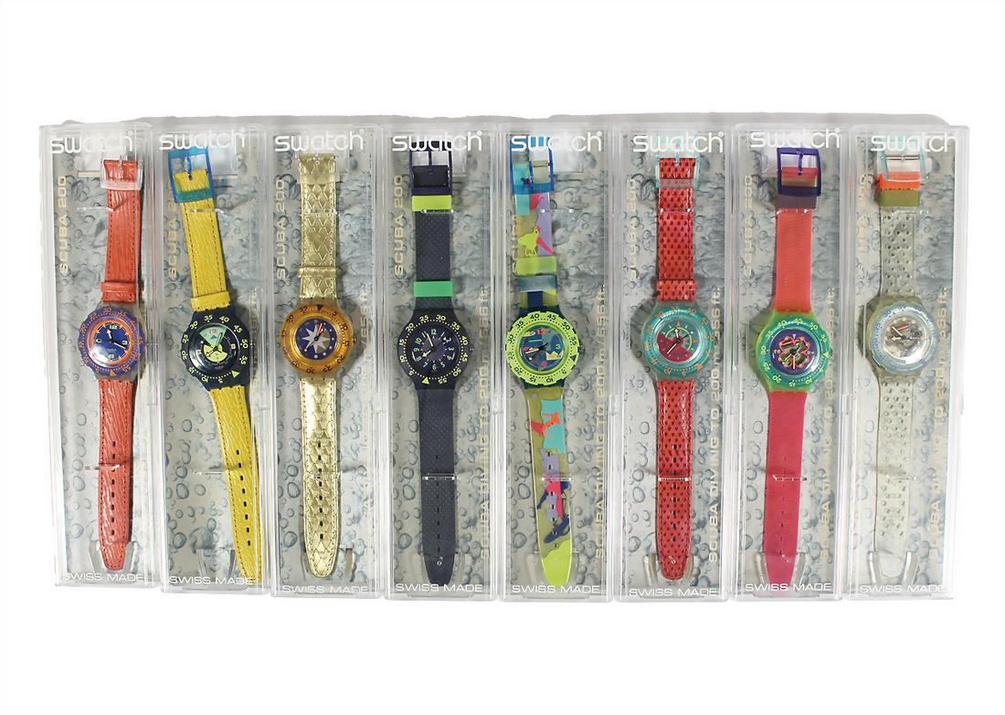 lot: 8 Swatch clocks, quartz, SCUBA/SCUBA 200, (200 m waterproof), and others DEVINE, RED ISLAND and (1 of 1)