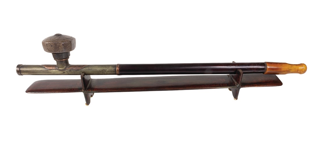 ancient Chinese opium pipe early 20th century, metal setting,  length = 45.0 cm, decorative stand (1 of 2)