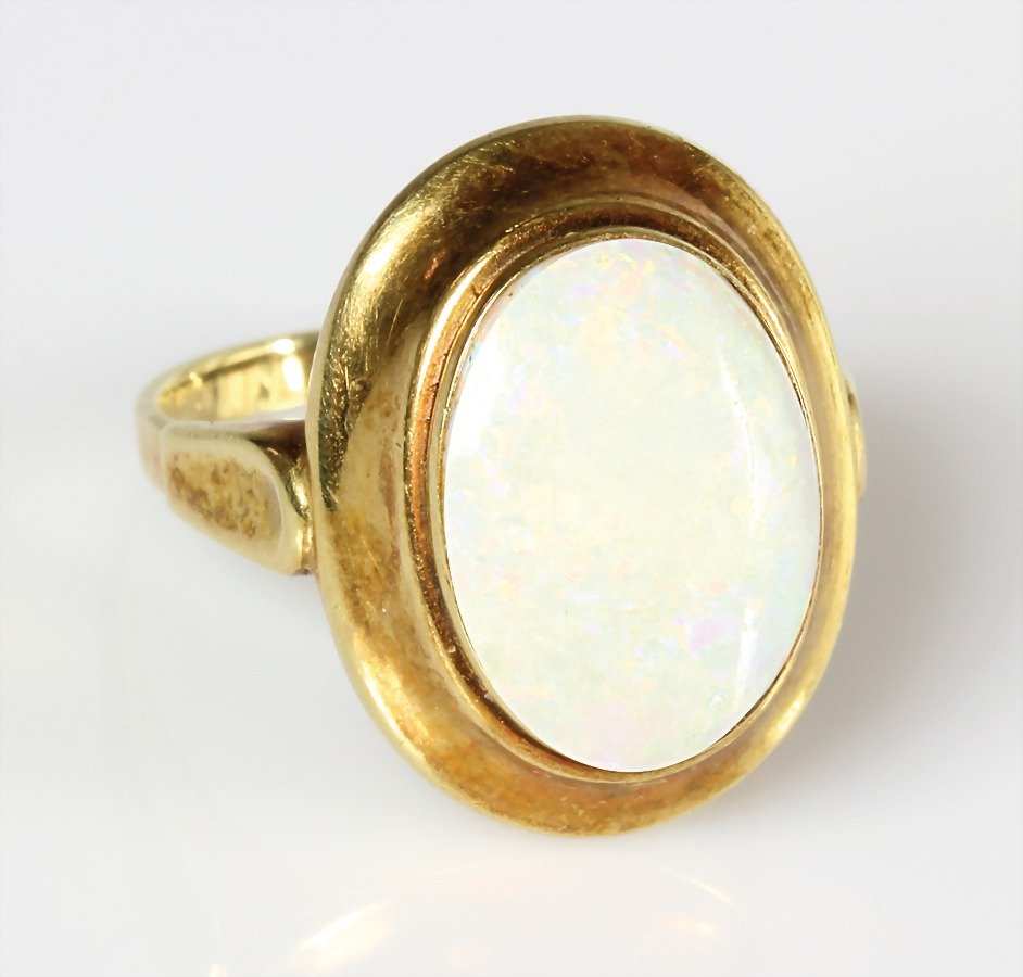 Ring, GG 585/000, Weißopal ( ca.13,5 x 10,0 mm),: Ring, GG 585/000, Weißopal ( ca.13,5 x 10,0 mm), schönes Farbenspiel mit Grün-u. Rottönen, RW ca. 53,5