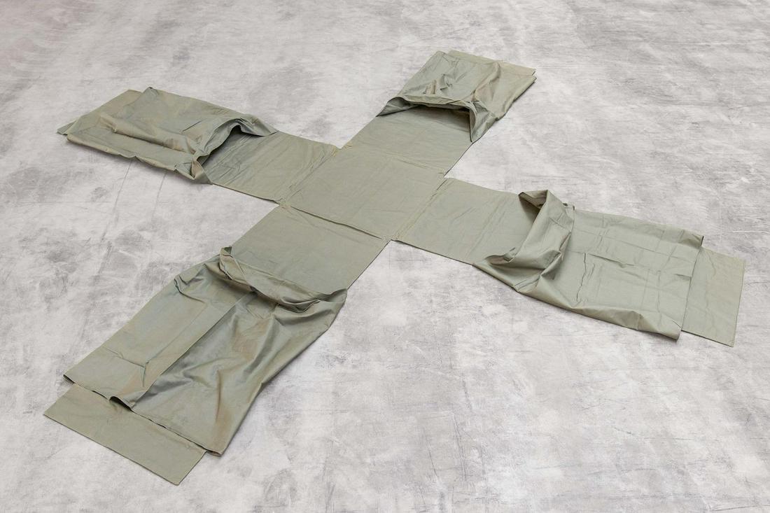 Franz Erhard Walther | Zentriert (Centered): WALTHER, FRANZ ERHARD1939 FuldaTitle: Zentriert (Centered). Date: 1967. Technique: Double-stitched, green tent fabric with foam filling, sewn together in a cross shape, with a sewn wide loop o