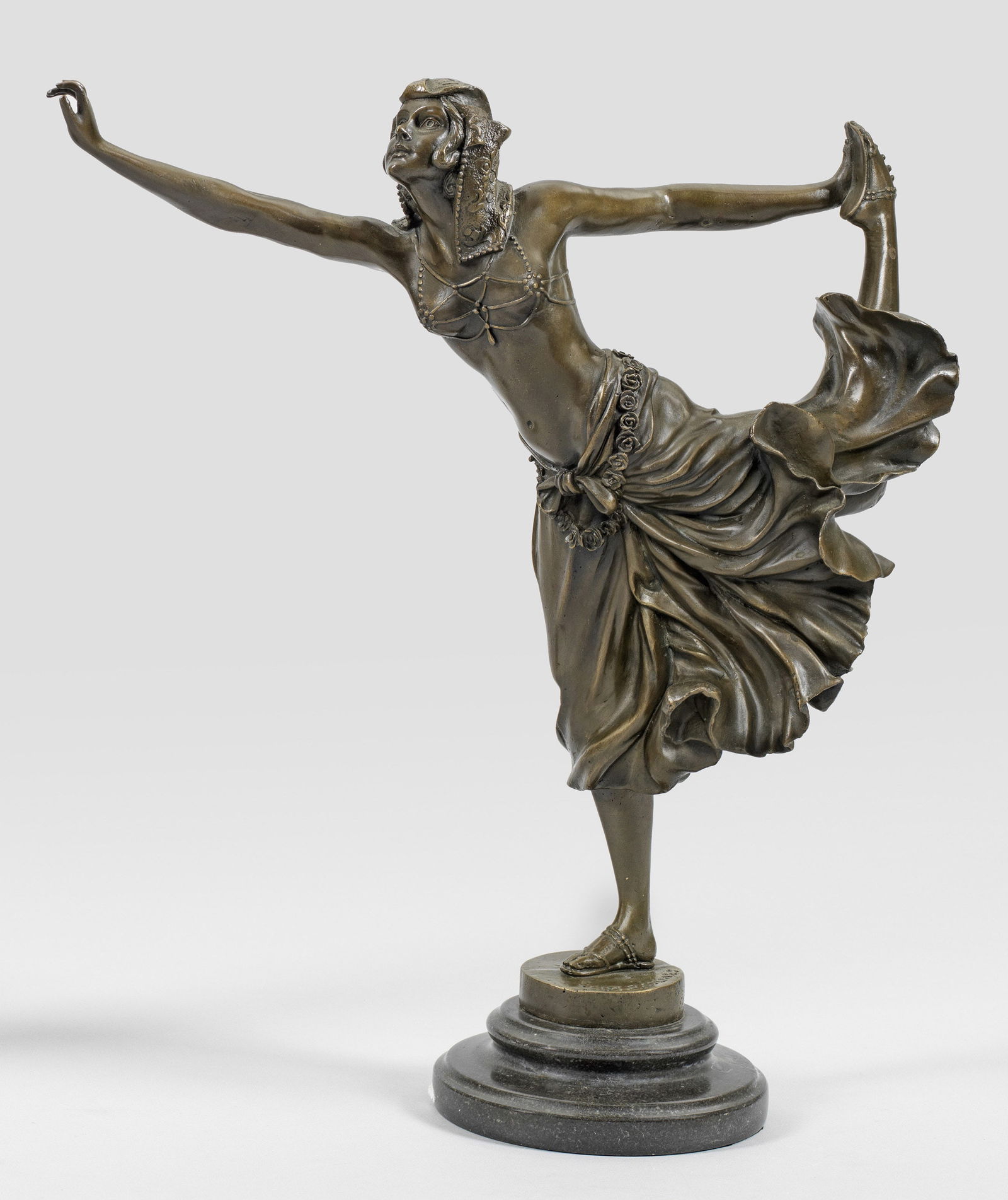 Claire Colinet: Claire Colinet (1880 Brussels - 1950 Asnières) after Art Nouveau figure of a dancer in oriental costume Bronze, brown patinated. Inscribed; dark grey stone base. Posthumous, contemporary cast, la