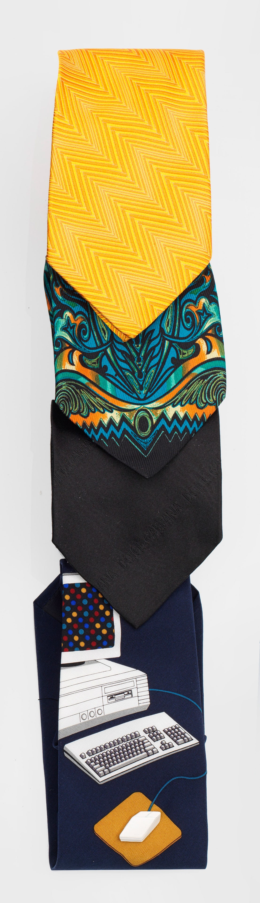 Four designer ties: Four designer ties by Vicky Davis, Jean Paul Gaultier, Dolce & Gabbana and ETRO Silk. "Mouse trap" with applied, white lacquered metal computer mouse and calculator on a blue background, arabesque