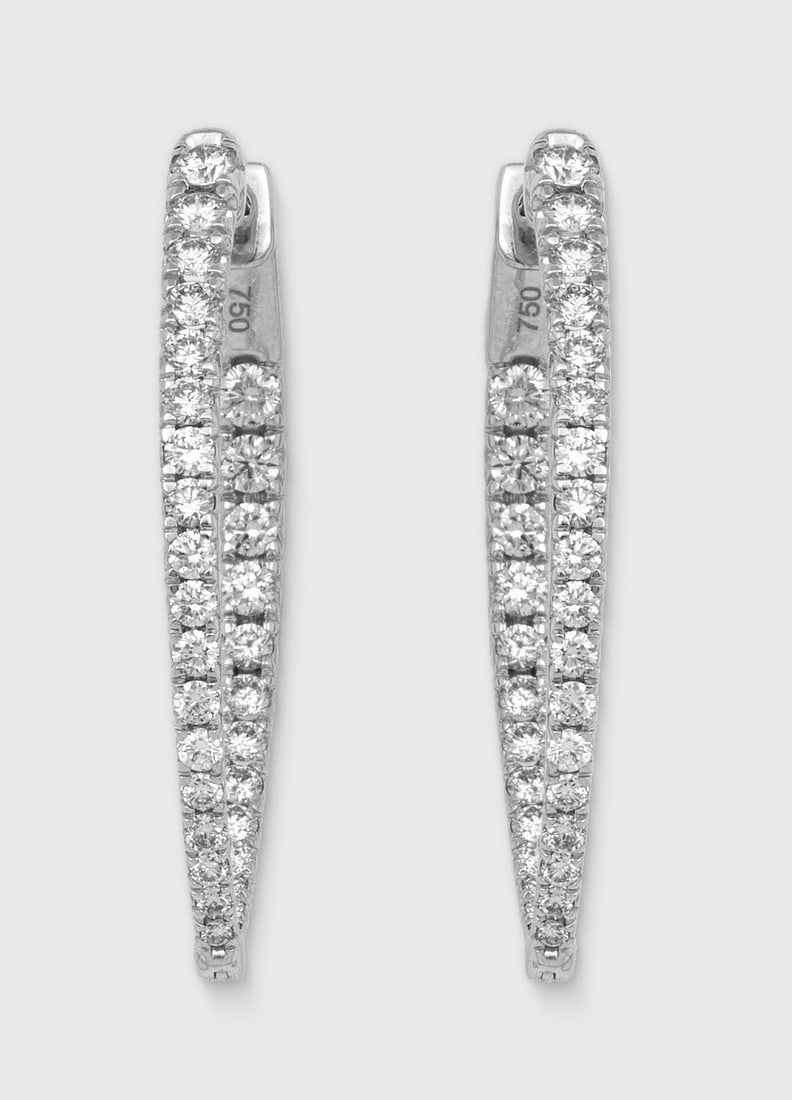 Paar hochfeine Brillant-Creolen: Weißgold, gest. 750. Schauseitig besetzt mit Brillanten von zus. ca. 2,09 ct. (F-G/vs). Ges.-Gew. ca. 6,92 g. Pair of earrings set with brilliants approx. 2,09 ct. (F-G/vs), in 18 k white gold.