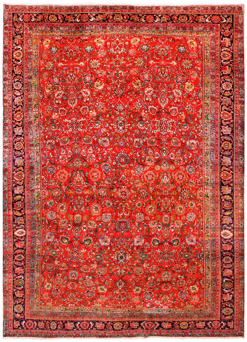 Großer Bidjar-Teppich: Persien. Um 1960. Wolle auf Baumwolle. Im hellroten Innenfeld flächendeckende Musterung aus dicht angeordneten Palmettenranken. Umlaufend dunkelgrundige Palmettenbordüre, flankiert von schmalen Bän