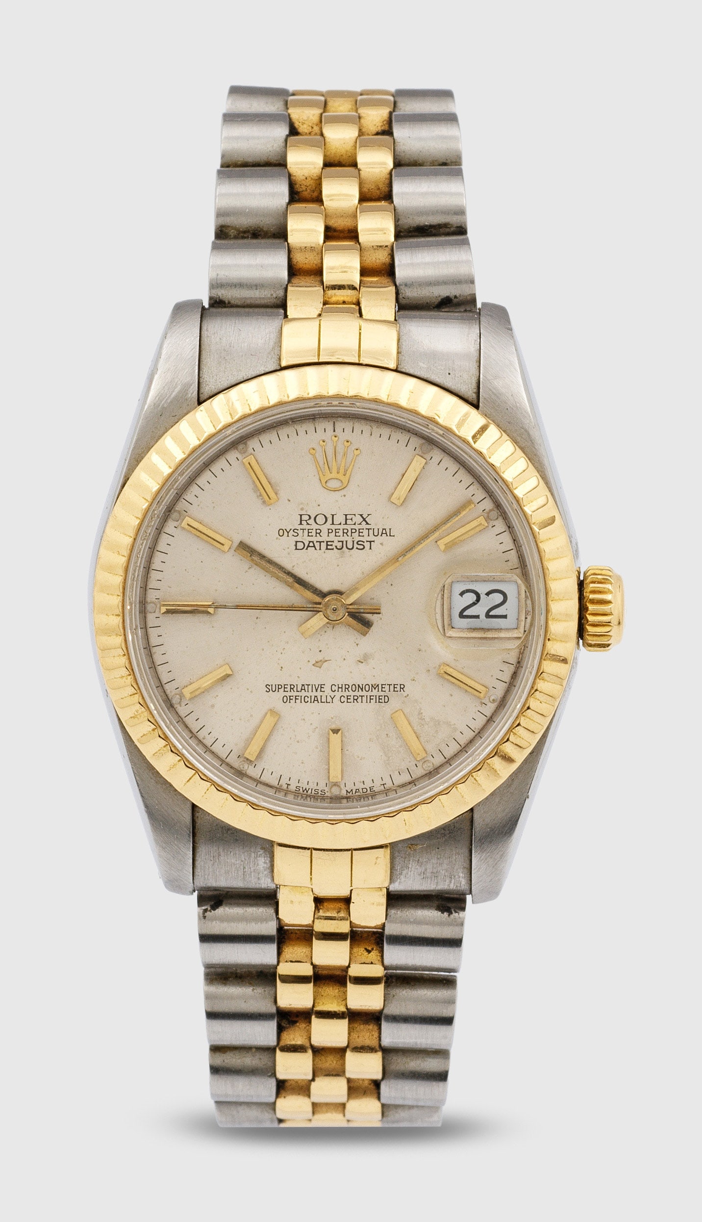 Armbanduhr von Rolex-"Datejust", um 1987: Stahl und Gelbgold, 18 ct.; Rundes Uhrengehäuse mit geriffelter Lunette, champagnerfarbenes Zifferblatt mit Stabindexen und Zeigern mit Tritiumauflage, Datumsanzeige. Jubilee-Armband mit doppelter Fa