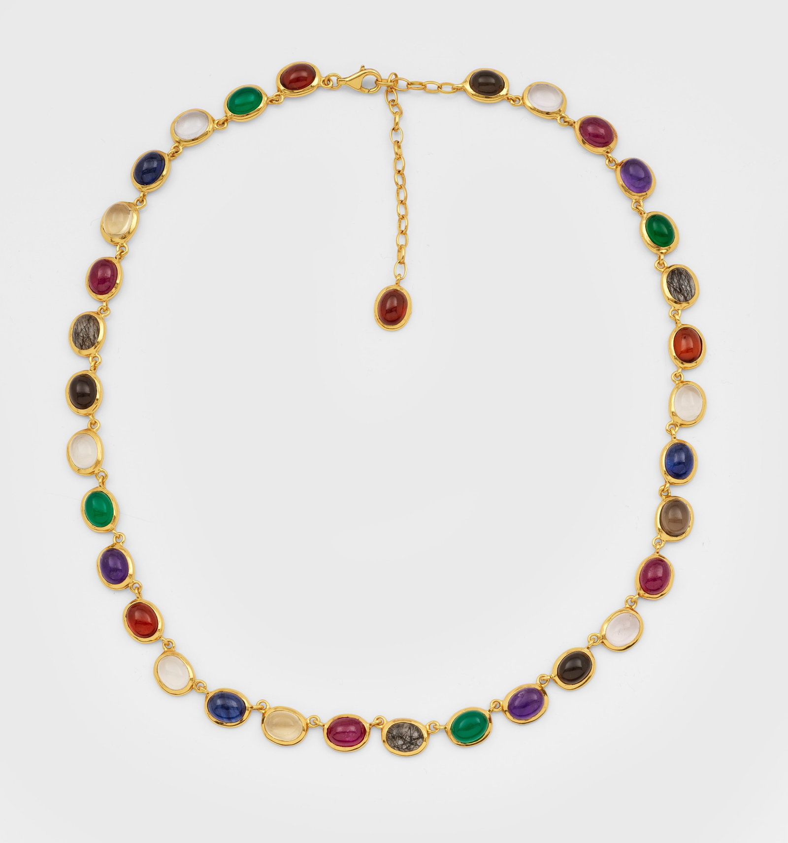 Klassisches Multicolor-Collier: Silber, vergoldet, gest. 925. Schauseitig besetzt mit Amethysten von zus. ca. 5,7 ct., Rauchquarz von zus. 7,60 ct., Rutilquarz von zus. ca. 5,7 ct., grüner Granat von zus. ca. 8 ct., Karneol von zus