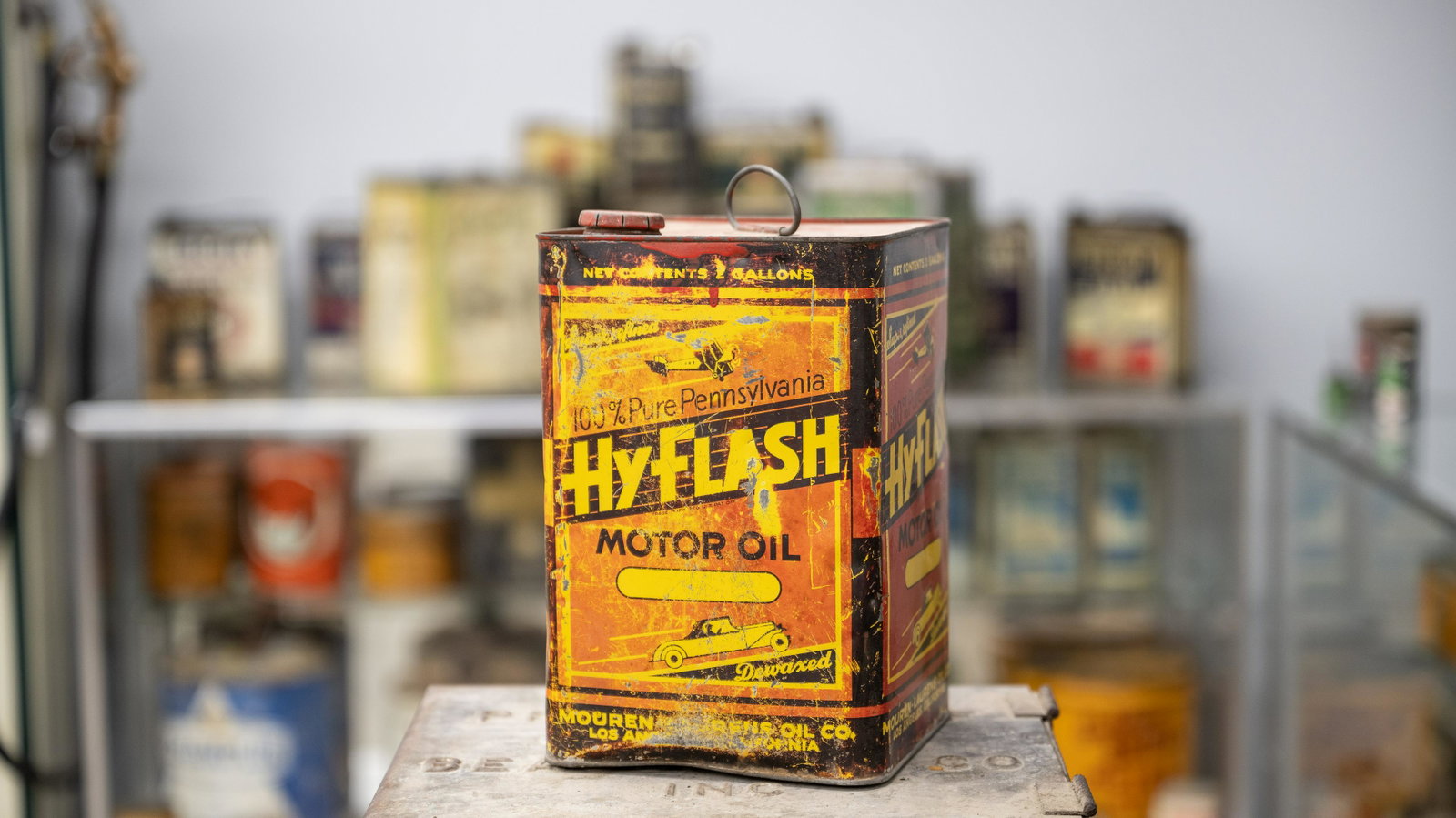 HyFlash Motor Oil 2-Gallon Oil Can: Lot G101 - HyFlash Motor Oil 2-Gallon Oil Can HIGHLIGHTS Original* Super Refined 100% Pure Pennsylvania Dewaxed Mouren-Laurens Oil Co. Los Angeles, California Location: Bowtie Room *A designation of "