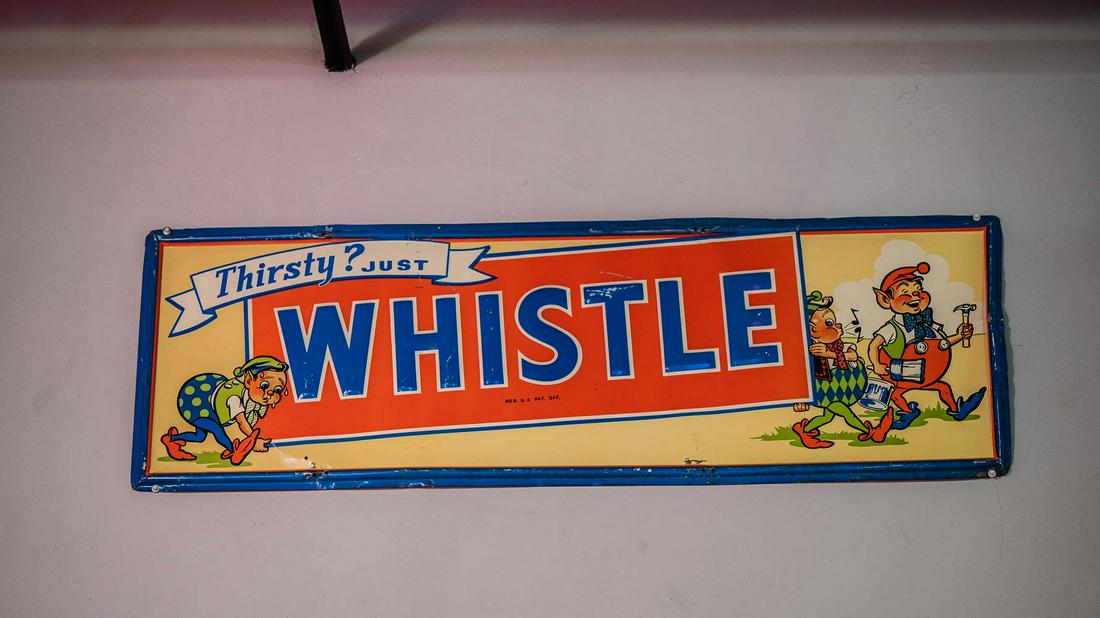 1948 Whistle Orange Soda Single-Sided Embossed Tin Sign (1 of 7)