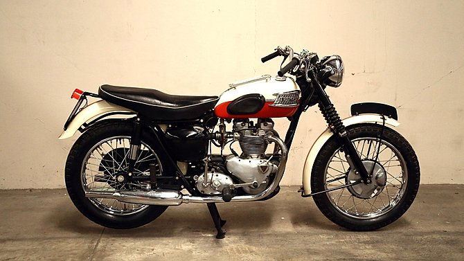 S136 - 1957 Triumph TR6: - This motorcycle was the June 2011 Baxter Calendar bike- Nut and bolt original with original paint and decals- Shows 7600 miles on the clock- Beautiful patina this bike is for the serious collector