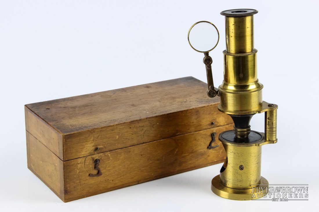 A travelling microscope, brass and ebonised wood, in (1 of 4)