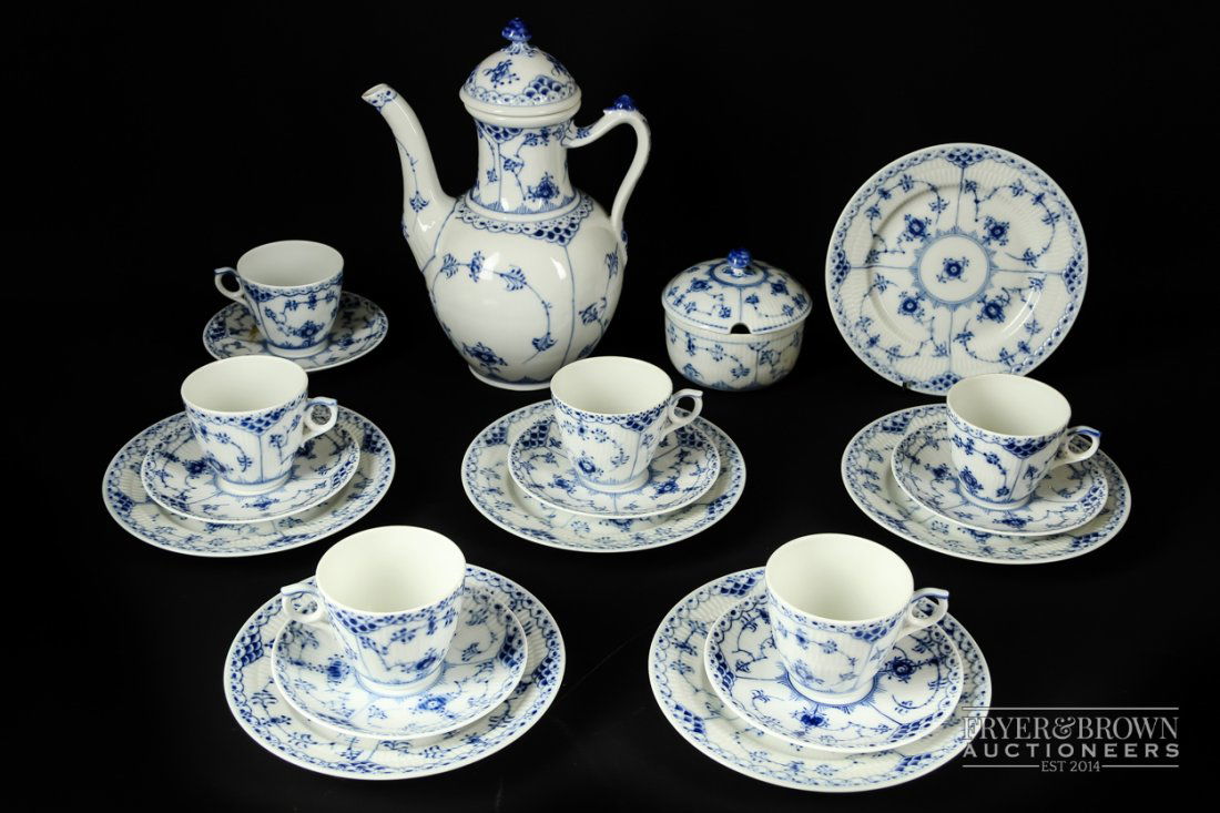 A Royal Copenhagen porcelain part coffee service, in: A Royal Copenhagen porcelain part coffee service, in 'Blue fluted half lace' pattern, comprising coffee pot & cover, shape 519; sugar box & cover, shape 2249; six coffee cups & saucers, shape 719; and