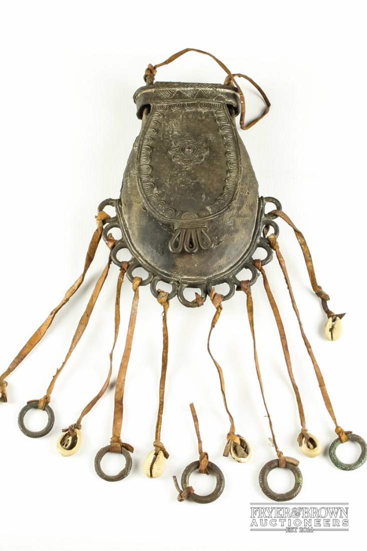 An African bronze pouch, hung with leather straps (1 of 4)