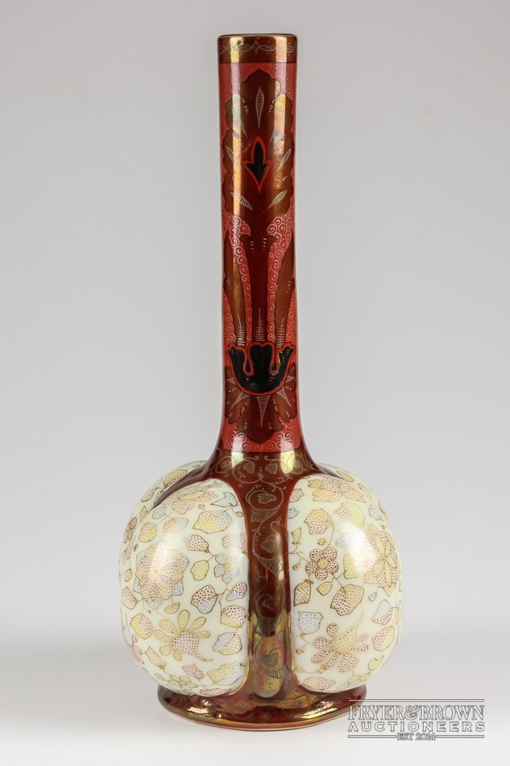 A Bohemian opaline bottle vase, lobed body, decorated: A Bohemian opaline bottle vase, lobed body, decorated in Persian influence marked Carlsbad with stylised Isnik flowers, 29.5cm