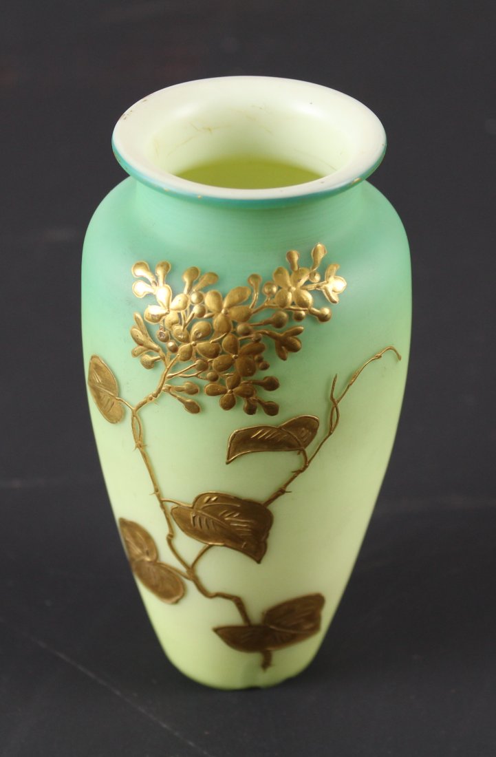 A Stourbridge glass peach bloom slender ovoid vase,: A Stourbridge glass peach bloom slender ovoid vase, possibly Thomas Webb, of unusual blue/green to yellow graduation, gilding with butterfly and flowering shrub, 13cm high