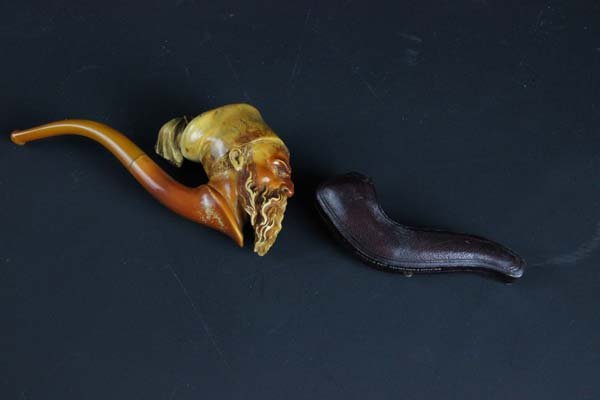 A Meerchaum pipe, cast as a n old man with beard and (1 of 2)