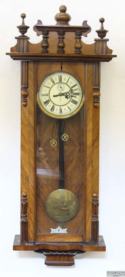A Gustav Becker Vienna regulator wall clock, of walnut: A Gustav Becker Vienna regulator wall clock, of walnut case, marked GB with anchor to dial, double weights, pendulum and winder, 120cm max length