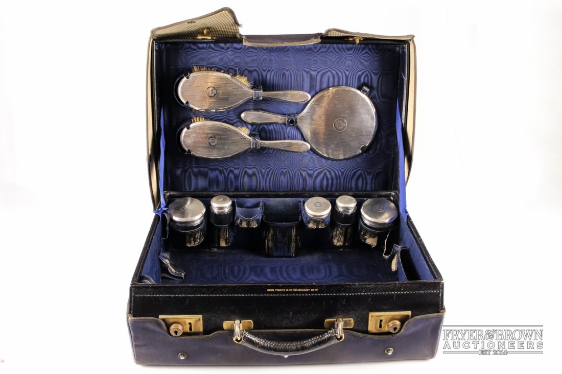 A John Pound & Co leather dressing case, fitted with a (1 of 5)