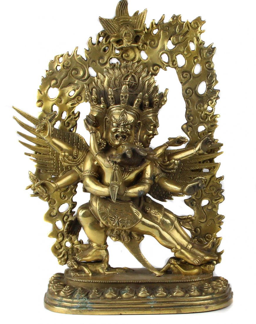 A Tibetan gilt bronze figure of Yamantaka and his (1 of 4)