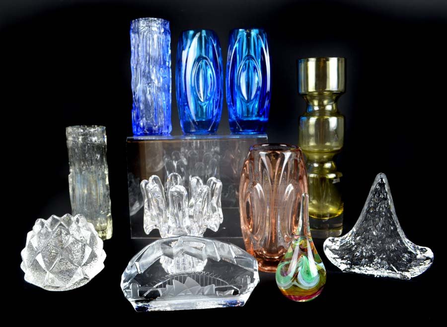 A group of modern art glass, comprises a Bo Borgstorm: A group of modern art glass, comprises a Bo Borgstorm design vase Svensk form by Aseda, original label; a Goran Warff for Kosta Boda sunflower candleholder; Orrefors artichoke candleholder designed by
