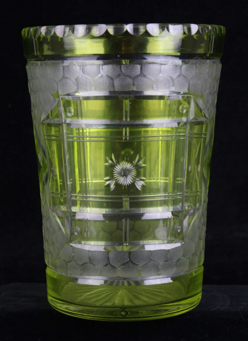 A Thomas Webb Uranium yellow cut glass bucket vase, cut: A Thomas Webb Uranium yellow cut glass bucket vase, cut with hatched panels on an acid finished battuto ground, 21 cm high