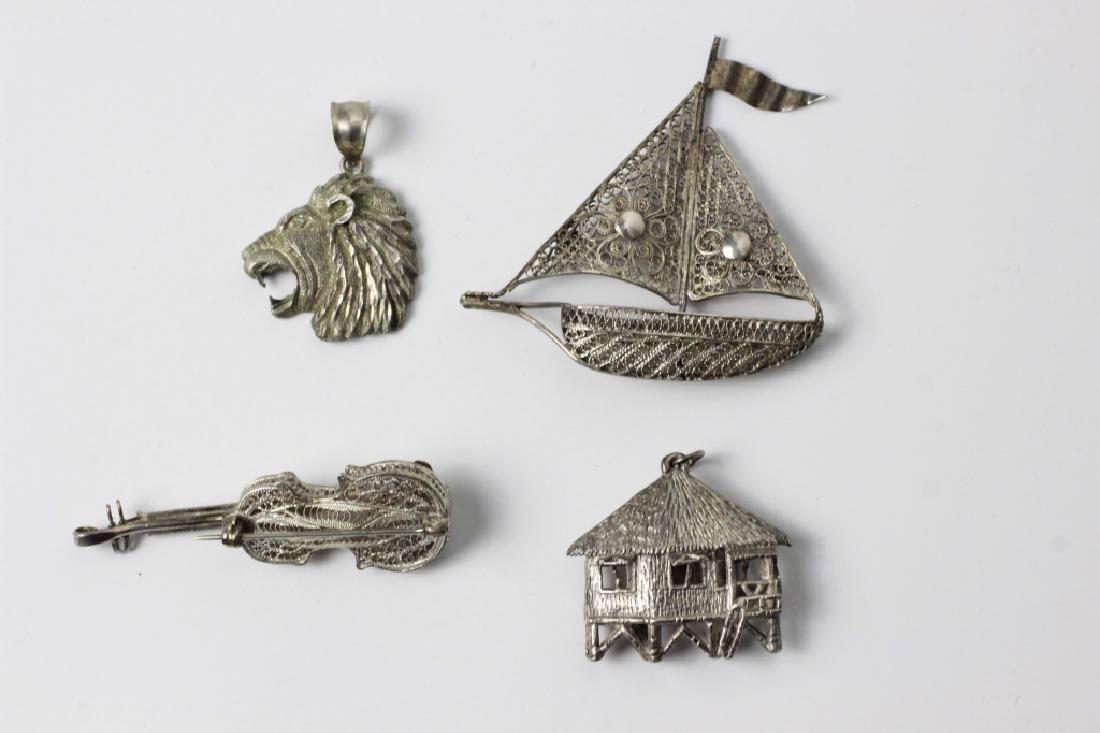 Two Silver Pendants And Two Silver Brooches (1 of 6)