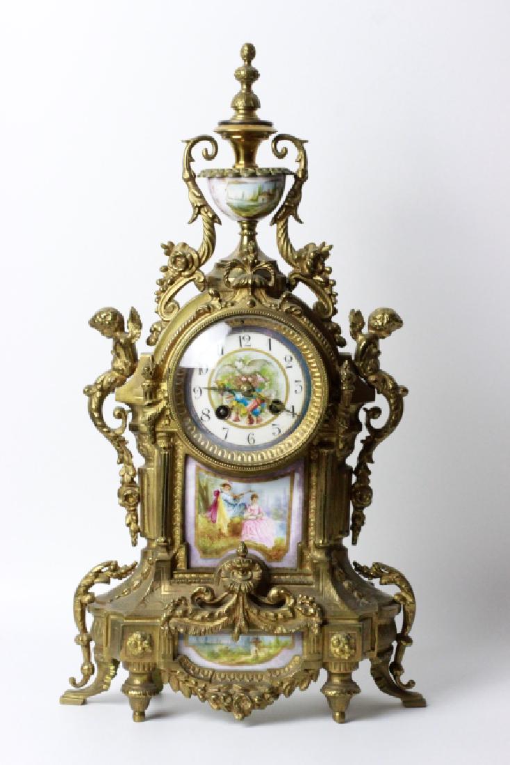 Bronze And Porcelain Cherib Clock: Bronze And Porcelain Cherib Clock 19" By 10"