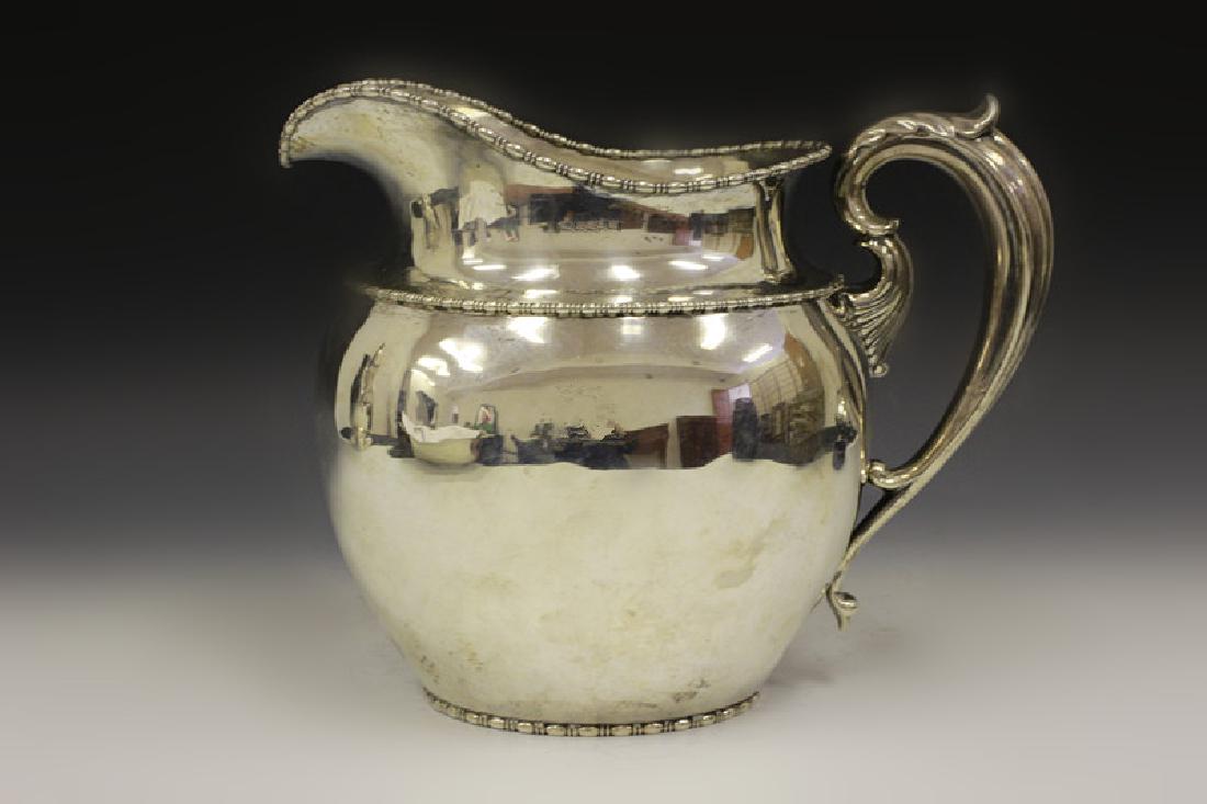 Sterling Silver Pitcher By Bigelow: Sterling Silver Pitcher By Bigelow Dimensions- H- 7" X W-8 1/2" Including Handle. Weight- 645.7gr. 20.5ozt From A New York City Home