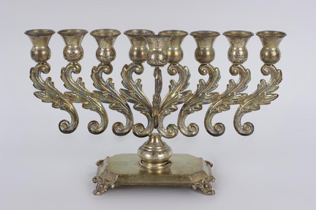Sterling Silver Judaica Menorah: Sterling Silver Judaica Menorah. Dimensions- H- 6 1/2" x W- 10". Weight- 349.1g. 11.22ozt